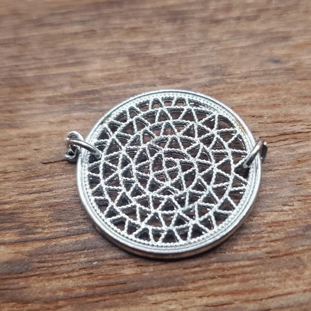 Sunburst lace‎ pendant